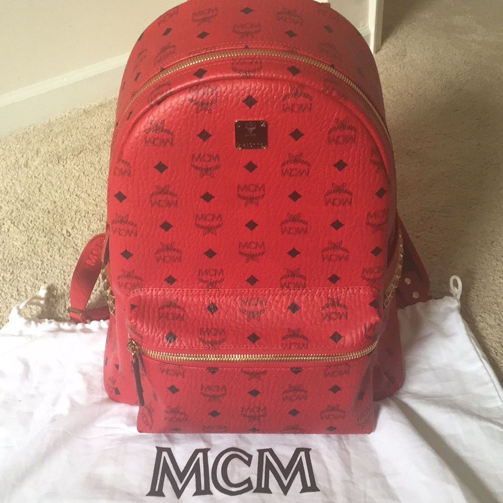 NWOT 100%authentic MCM md backpack w/studs SOLD OT